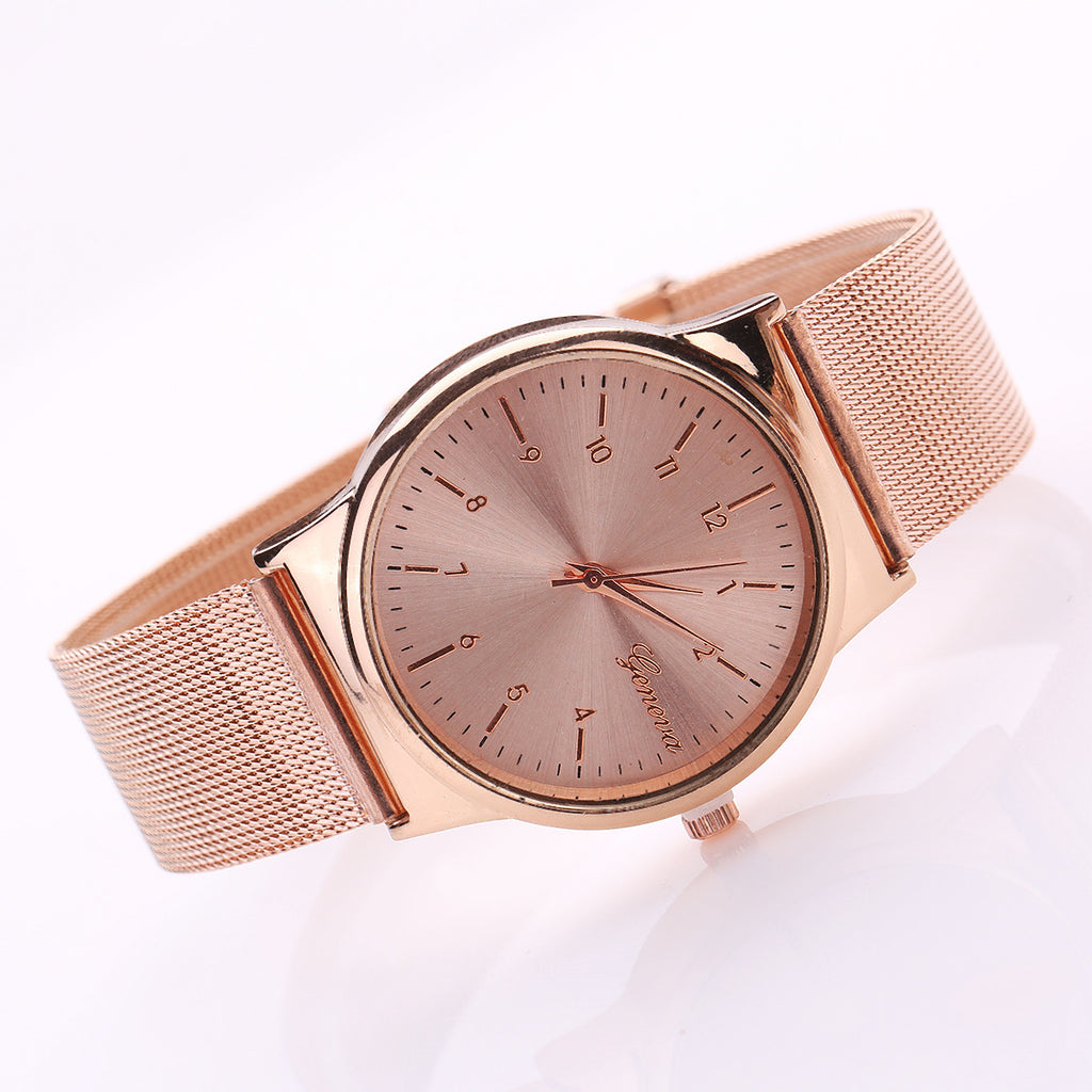 TitanGold Outdoor Sports Watch with a rose gold mesh strap and minimalist dial design.